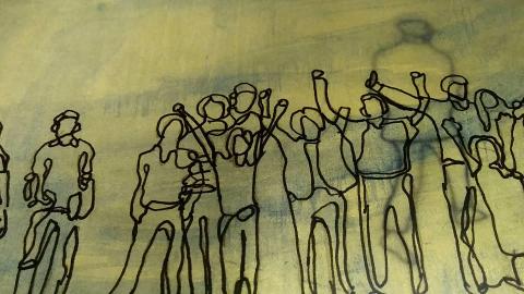 On a leafy green paper or fabric, a line sketch of a crowd of indivduals.